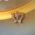 Golden butterfly pendant with rhinestone inlay measuring 18mm by 15mm for DIY jewelry - 123 Gold