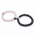 Detail view of pink quartz and black lava stone couple bracelets with magnetic crown charms - 07-Rose Quartz & Lava Stone