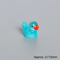 Miniature translucent blue resin duck figurine with glitter finish, size 11x15mm - Glow In The Dark Tiffany Blue