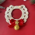 Close-up of handmade crochet Christmas pet collar with gold bell and star on red background - XS (1-2kg) / Red Bow Star Collar (With Bell)