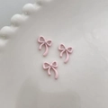 DIY nail art accessories featuring pink matte alloy ribbon bows on a white ceramic tray - Large-Rose Pink