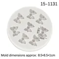 8.5cm round white silicone mold with 8 mini bowknot cavities for fondant cake decorating - Bowknot Style / Gray