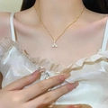 Collana in acciaio al titanio con pendente a coda di sirena dorata e diamanti - Oro (Coda di Sirena Strass)