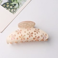 Cream floral claw clip with iridescent hollow flower patterns for women - Off White