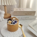Caramel cake scented candle with realistic cream and fruit toppings on lace coaster - Coffee Cake
