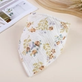 Detail of baby muslin bib featuring vintage floral pattern and soft gauze texture - Abundant Flowers