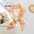 Orange silk twilly scarf featuring animal prints and letter S on a white background - Style S (Orange/White Animal Rope)