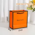 Small orange gift bag with black trim, Best Love print and woven handles, 17x8x17cm size - Small / Orange