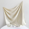 Close-up of champagne satin square scarf showing smooth silky texture and hem detail - 90*90cm / Milk White