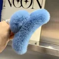Close-up of soft light blue rabbit fur hair claw clip with plush texture and fine details - Faux Fur / Sky Blue