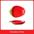 Strawberry-shaped ceramic hamster bowl in vibrant red with a glossy glaze finish - Strawberry Dish