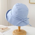 Detail of light blue sun hat featuring a subtle checkered texture and delicate bow tie - M(56-58cm) / Light Blue