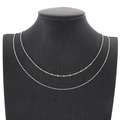 Silver double layer cross chain necklace with vibrant green enamel beads on neck model - Fluorescent Green