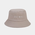 Detail of Stay Wild embroidery on khaki cotton bucket hat with white stitching texture - One Size / Khaki