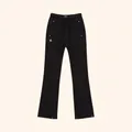 Dettaglio dei pantaloni svasati neri con coulisse in vita e borchie metalliche - S / Nero Selvaggio