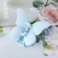 Light blue butterfly hair claw clip with matte finish and elegant butterfly design - Sky Blue