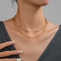 Double-layered gold snake chain necklace with oval metal beads for women - Gold Layered Rice Bead Chain