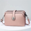 Elegant dusty rose faux leather multi-zip crossbody bag with silver twist lock and strap - Pink