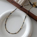 Beaded necklace with black faceted stones and gold spacers featuring a lobster clasp - Black Faceted Bead Gold Bead Simple Necklace (XL0285)