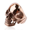 Detailed close-up of rose gold skull ring with punk gothic style and polished finish - Rose Gold