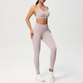 Pale purple two-piece yoga set featuring a halter sports bra and high-waisted leggings - XS / Porcelain Pink