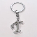 Polished silver metal keychain featuring a minimalist letter T pendant on a round ring - Letter T / Silver