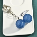 Sparkly dark blue glitter cherry keychain with silver metal leaves and clasp - Blue