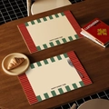 Waterproof leather placemat set with vintage stripe border and Happy Every Time text - Elegant Melody