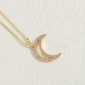 Elegant gold crescent moon necklace with sparkling pave set zircons on a delicate chain - Large Gold