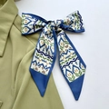 Green and blue geometric silk scarf styled as a neck tie on a light blazer - Blue Pop Art Style