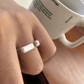 Minimalist silver open ring with geometric square and D-shaped elements on model's hand - Geometric D-Shape Open Ring (J4128)