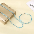 Zilveren boze oog sieradenset met blauwe kralen inclusief een ketting en armband - Armband 19CM / Lichtblauw
