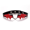 Detail of black leather choker with silver heart ring and red bat wings on white background - Red Wings Black PU Choker