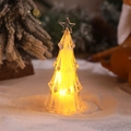 Close-up of acrylic Christmas tree night light with warm yellow LED on snowy background - Transparent Shell Warm Light