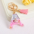 Pink glitter resin letter A keychain with tassel and gold metal star sequins - Letter A / Pink