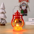 Detailaufnahme einer roten Weihnachts-Laterne mit warmem LED-Licht und Weihnachtsmann-Motiv - Roter Weihnachtsmann