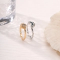 Detail of sun and moon rings with sparkling crystals on a textured surface - Sun Moon Couple Rings (Silver+Gold)