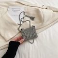Kids' rhinestone square bag with silver chain strap shown against a beige blazer - Small / Silver Rhinestone