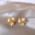 Macro view of gold branching earrings with three round white pearls on champagne silk - 30# Gold Coral Radiative Pearl Style (HE30401)