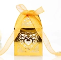 Detail of gold laser-cut heart candy box with glossy finish and matching silk ribbon - Reflective Gold