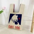 Knitted tote bag in cream white featuring cute dog illustration and red heart detail - Beige Cute Dog