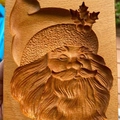 Beech wood cookie mold with detailed Santa Claus carving and natural grain finish - Santa Claus