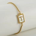 Stainless steel 18k gold bracelet featuring a shell inlay pendant with letter T - Letter T