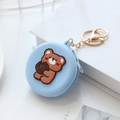 Light blue silicone mini coin purse featuring a 3D cartoon bear with a gold keychain - Biscuit Bear