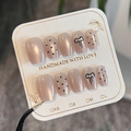 Handgefertigte Cat-Eye-Nägel zum Aufdrücken mit schwarzen Punkten und Schleife - XS / SP113 Klebertyp