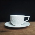 Service tasse à café et soucoupe en céramique blanche avec textures de feuilles en relief - Tasse à Café et Soucoupe Luanfeng (Blanc) 250ml (Coton Perlé)