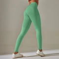 Detailed view of mint green high-waisted seamless yoga pants with textured jacquard knit - Light Green