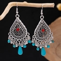 Detail of bohemian drop earrings with turquoise beads on a rustic wooden branch - Antique Silver + Red Rhinestone + Turquoise (E5775-13)