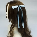Elegant light blue satin bow hair clip with long ribbons for women on brown wavy hair - Sky Blue