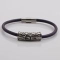 Detail of purple braided leather bracelet with silver magnetic clasp and hollow carvings - Platinum Q